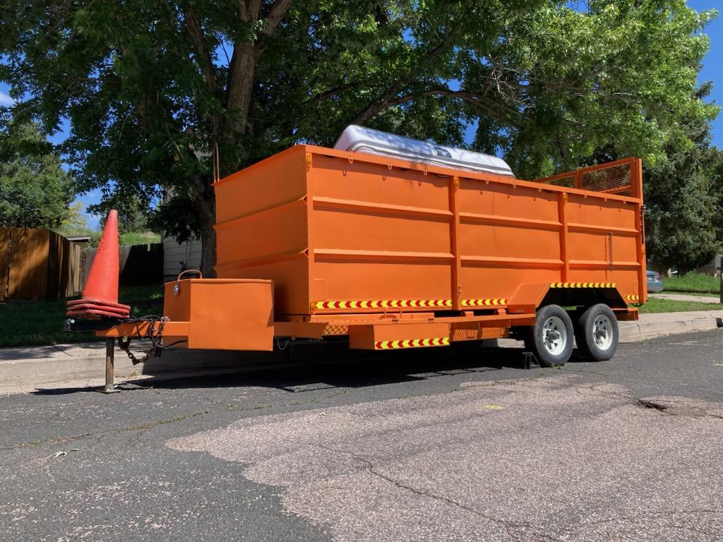 Large orange hauling trailer